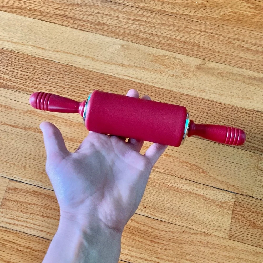 Small red silicone rolling pin